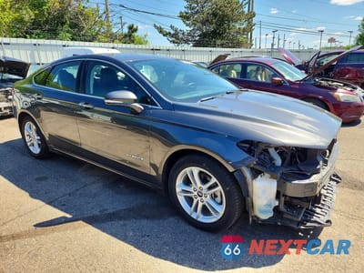Czwarte zdjęcie samochodu z boku: 2018 FORD FUSION SE HYBRID VIN:3FA6P0LU4JR253513 - miniatura