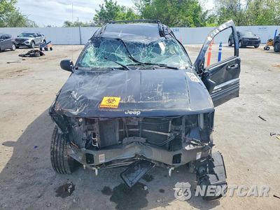 Piąte zdjęcie samochodu w środku: 2003 JEEP GRAND CHEROKEE OVERLAND VIN:1J8GW68J33C611908 - miniatura