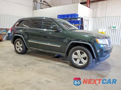 Czwarte zdjęcie samochodu z boku: 2011 JEEP GRAND CHEROKEE LAREDO VIN:1J4RS4GG5BC545134 - miniatura