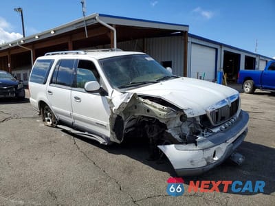 Czwarte zdjęcie samochodu z boku: 1999 LINCOLN NAVIGATOR VIN:5LMPU28A5XLJ34855 - miniatura