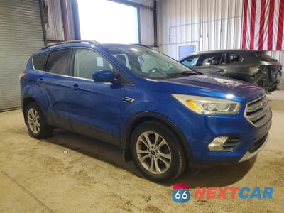 Czwarte zdjęcie samochodu z boku: 2017 FORD ESCAPE SE VIN:1FMCU0GD6HUB41200 - miniatura