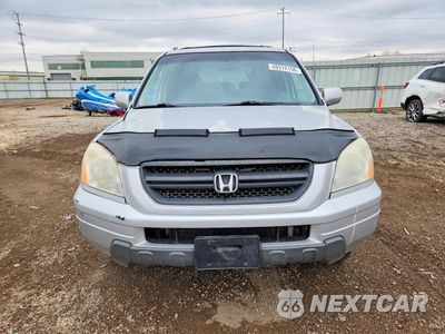 Piąte zdjęcie samochodu w środku: 2004 HONDA PILOT EXL VIN:2HKYF18524H585504 - miniatura