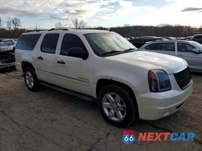 Czwarte zdjęcie samochodu z boku: 2010 GMC YUKON XL K1500 SLT VIN:1GKUKKE33AR281903 - miniatura