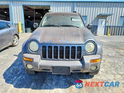 Piąte zdjęcie samochodu w środku: 2002 JEEP LIBERTY SPORT VIN:1J4GL48K02W297445 - miniatura