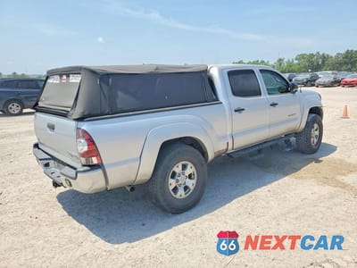 Trzecie zdjęcie samochodu z tyłu: 2011 TOYOTA TACOMA DOUBLE CAB PRERUNNER LONG BED VIN:3TMKU4HN4BM030591 - miniatura