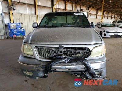 Piąte zdjęcie samochodu w środku: 2003 FORD F150 VIN:1FTRX18L63NA20428 - miniatura