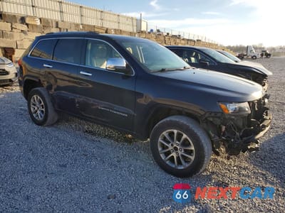 Czwarte zdjęcie samochodu z boku: 2014 JEEP GRAND CHEROKEE OVERLAND VIN:1C4RJFCG8EC141100 - miniatura