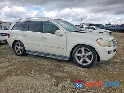 Czwarte zdjęcie samochodu z boku: 2009 MERCEDES-BENZ GL 450 4MATIC VIN:4JGBF71E19A445344 - miniatura