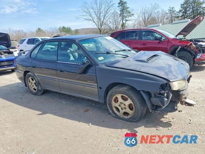 Czwarte zdjęcie samochodu z boku: 1999 SUBARU LEGACY VIN:4S3BD685XX7262304 - miniatura