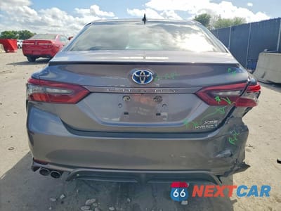 Zdjęcie 6 z 12 samochodu: 2021 TOYOTA CAMRY HYBRID XSE VIN:4T1K31AK3MU565584 - miniatura