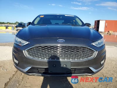 Piąte zdjęcie samochodu w środku: 2020 FORD FUSION TITANIUM VIN:3FA6P0D93LR115278 - miniatura