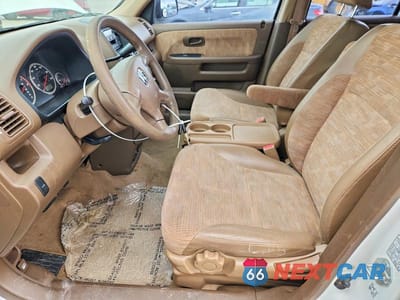 Zdjęcie 7 z 14 samochodu: 2002 HONDA CR-V LX VIN:JHLRD68452C000280 - miniatura