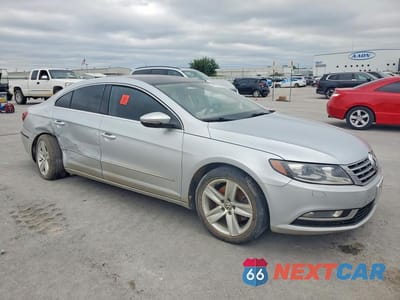 Czwarte zdjęcie samochodu z boku: 2014 VOLKSWAGEN CC SPORT VIN:WVWBN7AN3EE527389 - miniatura