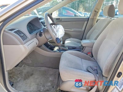 Zdjęcie 7 z 12 samochodu: 2003 TOYOTA CAMRY LE VIN:4T1BE32K83U784382 - miniatura
