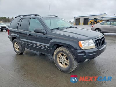 Czwarte zdjęcie samochodu z boku: 1999 JEEP GRAND CHEROKEE LIMITED VIN:1J4GW68S3XC615263 - miniatura