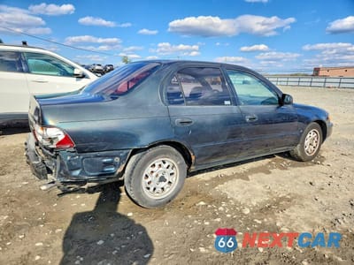 Trzecie zdjęcie samochodu z tyłu: 1996 TOYOTA COROLLA BASE VIN:1NXBA02E1TZ475566 - miniatura