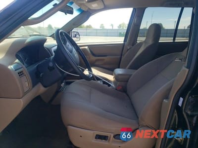 Zdjęcie 7 z 13 samochodu: 2004 JEEP GRAND CHEROKEE LAREDO VIN:1J4GX48S94C132700 - miniatura