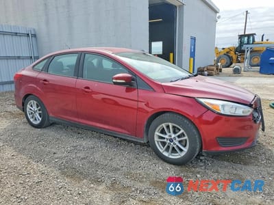Czwarte zdjęcie samochodu z boku: 2015 FORD FOCUS SE VIN:1FADP3F21FL229016 - miniatura
