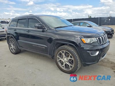 Czwarte zdjęcie samochodu z boku: 2018 JEEP GRAND CHEROKEE LIMITED VIN:1C4RJEBG6JC275139 - miniatura