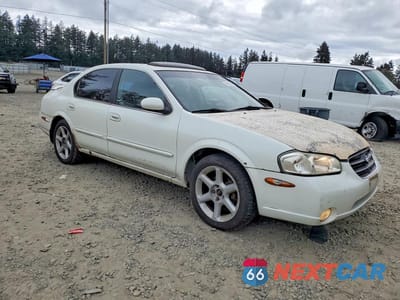 Czwarte zdjęcie samochodu z boku: 2001 NISSAN MAXIMA GXE VIN:JN1CA31A01T318884 - miniatura