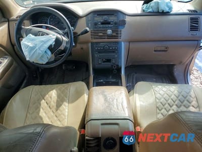 Zdjęcie 8 z 13 samochodu: 2004 HONDA PILOT EXL VIN:2HKYF18634H535591 - miniatura