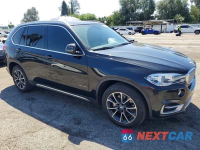 Czwarte zdjęcie samochodu z boku: 2017 BMW X5 XDR40E VIN:5UXKT0C30H0S81264 - miniatura