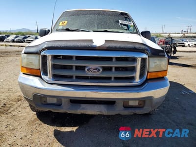 Piąte zdjęcie samochodu w środku: 1999 FORD F250 SUPER DUTY VIN:1FTNX20S3XEA50063 - miniatura