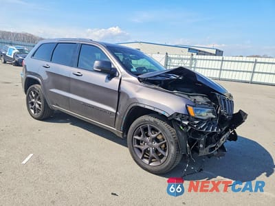 Czwarte zdjęcie samochodu z boku: 2021 JEEP GRAND CHEROKEE LIMITED VIN:1C4RJFBG5MC704572 - miniatura