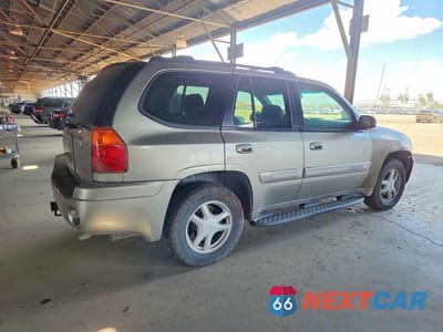 Trzecie zdjęcie samochodu z tyłu: 2003 GMC ENVOY VIN:1GKDT13S932145398 - miniatura