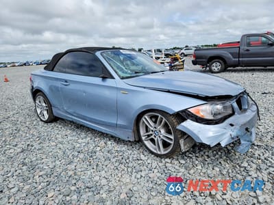 Czwarte zdjęcie samochodu z boku: 2011 BMW 135 I VIN:WBAUN7C51BVM25040 - miniatura