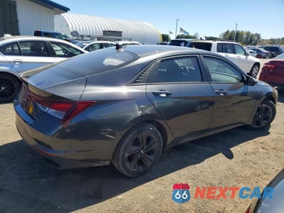 Trzecie zdjęcie samochodu z tyłu: 2021 HYUNDAI ELANTRA SEL VIN:5NPLM4AG6MH009847 - miniatura