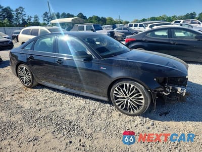 Czwarte zdjęcie samochodu z boku: 2018 AUDI A6 PREMIUM VIN:WAUF3AFC7JN046029 - miniatura