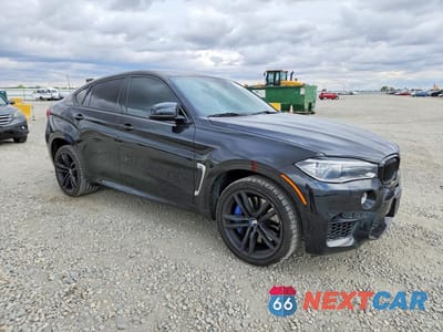 Czwarte zdjęcie samochodu z boku: 2015 BMW X6 M VIN:5YMKW8C58F0R42777 - miniatura