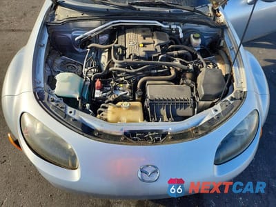 Zdjęcie 11 z 12 samochodu: 2006 MAZDA MX-5 MIATA VIN:JM1NC25F360121605 - miniatura