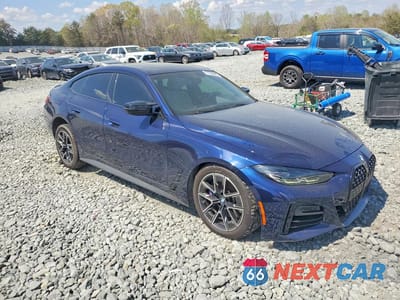 Czwarte zdjęcie samochodu z boku: 2022 BMW M440XI GRAN COUPE VIN:WBA13AW03NFM47089 - miniatura