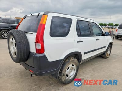 Trzecie zdjęcie samochodu z tyłu: 2002 HONDA CR-V LX VIN:JHLRD68452C000280 - miniatura