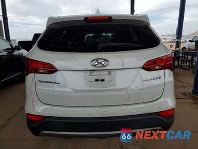 Zdjęcie 6 z 12 samochodu: 2014 HYUNDAI SANTA FE SPORT 2.0T VIN:5XYZU3LA9EG172983 - miniatura