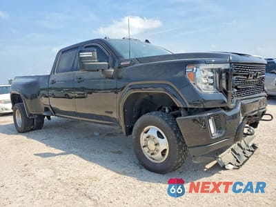 Czwarte zdjęcie samochodu z boku: 2020 GMC SIERRA K3500 DENALI VIN:1GT49WEY1LF202758 - miniatura