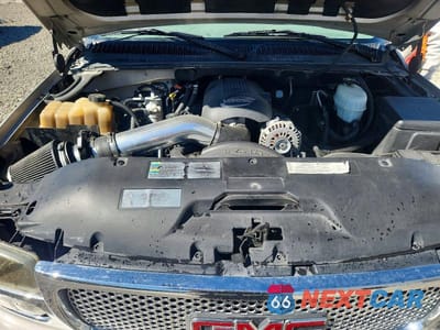 Zdjęcie 12 z 12 samochodu: 2004 GMC YUKON XL DENALI VIN:1GKFK66U24J203624 - miniatura