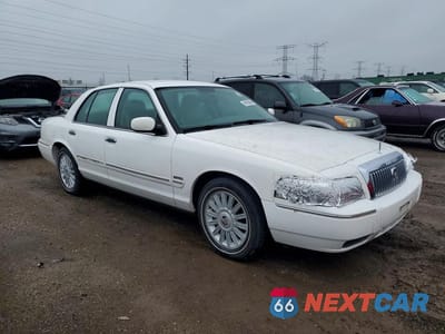Czwarte zdjęcie samochodu z boku: 2010 MERCURY GRAND MARQUIS VIN:2MEBM7FV6AX630115 - miniatura