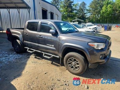 Czwarte zdjęcie samochodu z boku: 2017 TOYOTA TACOMA SR5 V6 VIN:5TFAZ5CN9HX030471 - miniatura