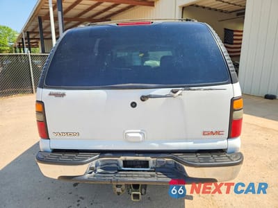Zdjęcie 6 z 12 samochodu: 2004 GMC YUKON VIN:1GKEC13Z04J279984 - miniatura