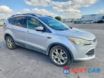 Czwarte zdjęcie samochodu z boku: 2013 FORD ESCAPE SE VIN:1FMCU0GX9DUC13351 - miniatura