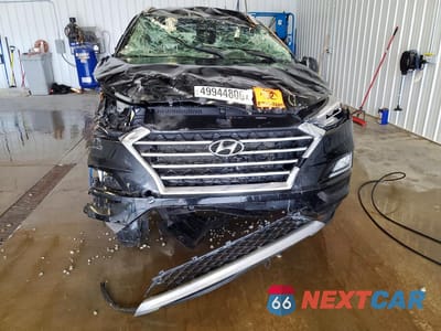 Piąte zdjęcie samochodu w środku: 2020 HYUNDAI TUCSON LIMITED VIN:KM8J3CALXLU271422 - miniatura