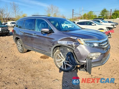 Czwarte zdjęcie samochodu z boku: 2016 HONDA PILOT TOURING VIN:5FNYF6H91GB101583 - miniatura