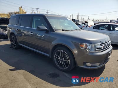 Czwarte zdjęcie samochodu z boku: 2015 FORD FLEX SEL VIN:2FMGK5C81FBA03581 - miniatura