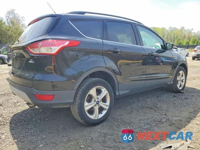 Trzecie zdjęcie samochodu z tyłu: 2016 FORD ESCAPE SE VIN:1FMCU9G90GUC74517 - miniatura