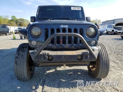 Piąte zdjęcie samochodu w środku: 2017 JEEP WRANGLER UNLIMITED SPORT VIN:1C4BJWDG2HL561987 - miniatura