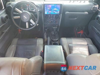 Zdjęcie 8 z 12 samochodu: 2010 JEEP WRANGLER UNLIMITED SAHARA VIN:1J4HA5H15AL213434 - miniatura