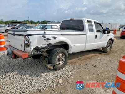Trzecie zdjęcie samochodu z tyłu: 1999 FORD F250 SUPER DUTY VIN:1FTNX20F8XEA49848 - miniatura